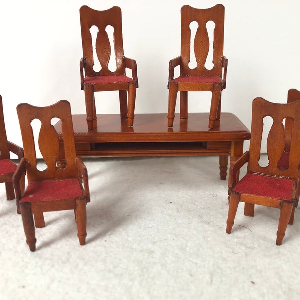 A sweet little set of dining room furniture. Smaller than 1.16