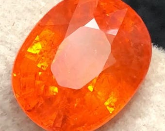 ファンタガーネット 6.40カラット オーバルカット – 鮮やかなオレンジ