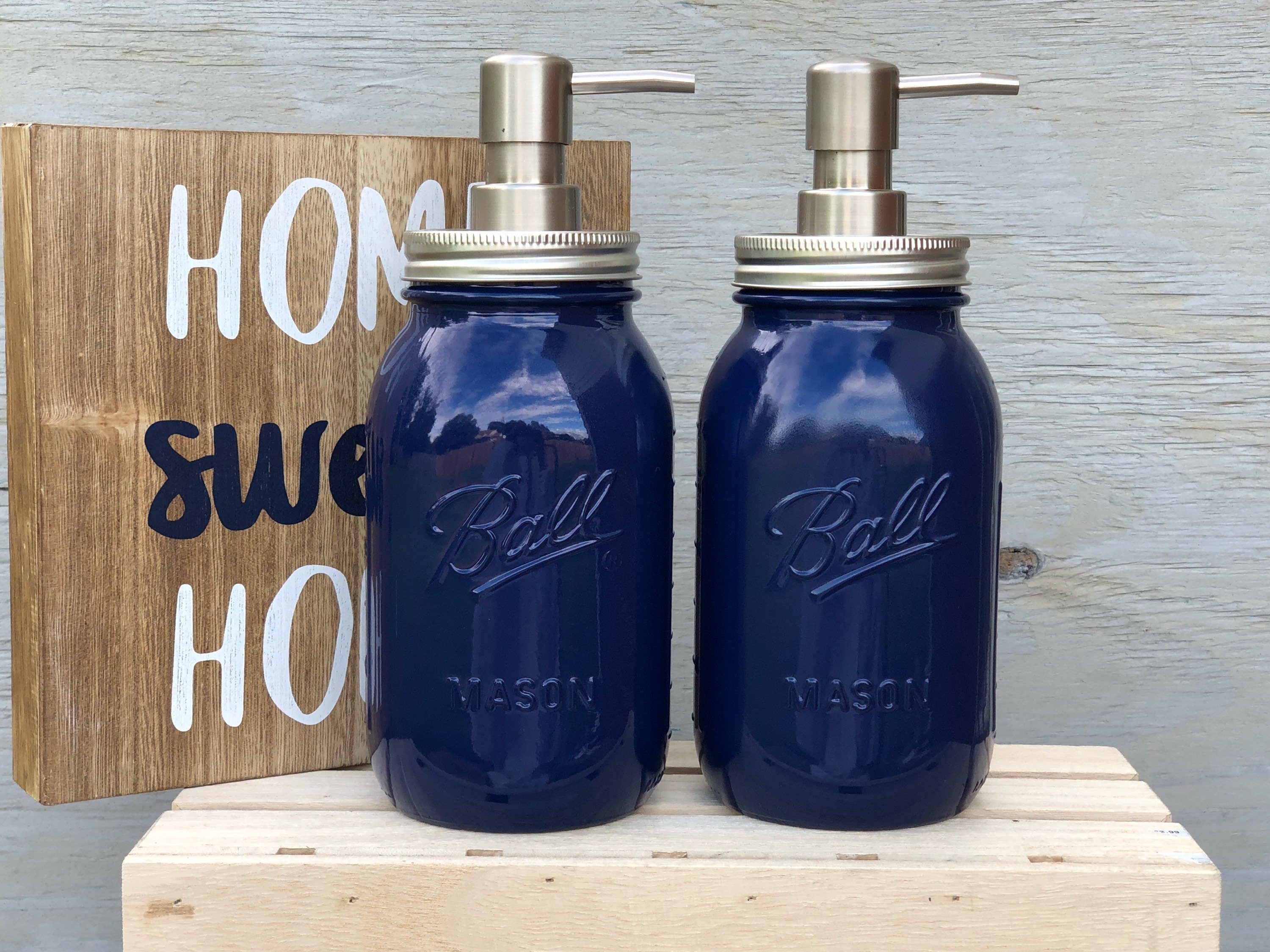 navy blue bathroom soap dispenser