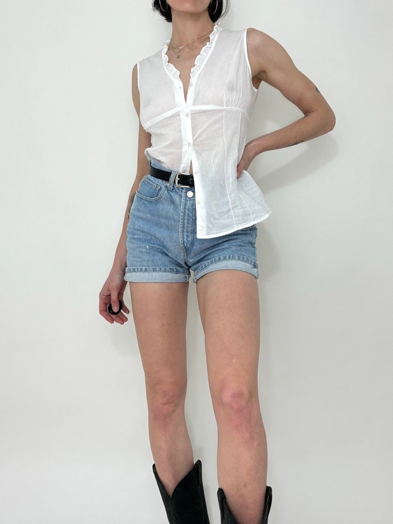 White Cotton Sleeveless Ruffle Collar Blouse