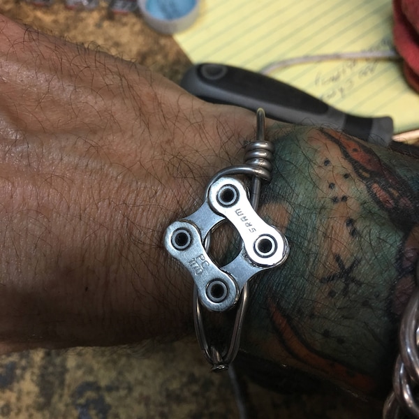 Bracelets made from bicycle spokes and parts plus other items custom orders and ideas welcomed