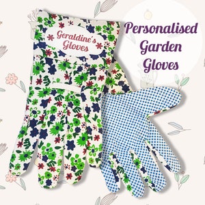 May include: A pair of personalised gardening gloves. One glove is white with a green and blue floral pattern and the other is white with blue polka dots. The floral glove has a white label with the text "Geraldine's Gloves" in pink.