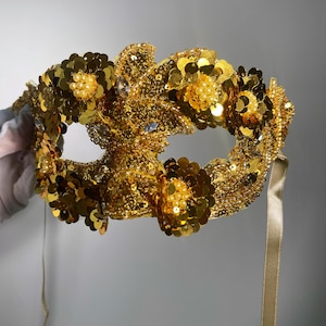 Gold masquerade mask, venetian mask. Mardi gras mask