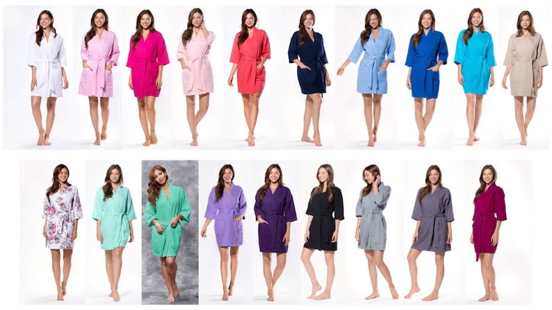 May include: A collection of 18 women's robes in various colors, including white, pink, red, blue, green, purple, black, and gray. The robes are made of a soft, comfortable material and feature a classic kimono style.