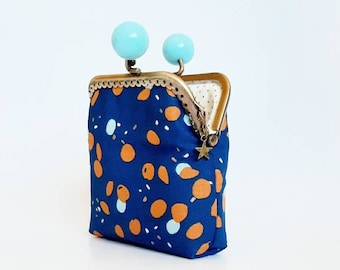 Dark blue cotton fabric wallet with caramel and gold polka dots, small fabric purse with metal clip closure and pastel blue balls