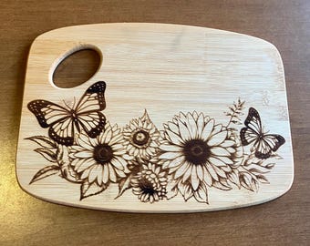Butterflies and flowers cutting board