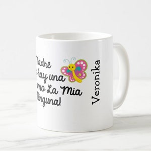 May include: White ceramic mug featuring a colorful butterfly design and the name "Veronika" in black. The mug has text in Spanish. A perfect gift for a loved one.
