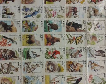 22 cent 1987 wildlife stamps used glued to poster board