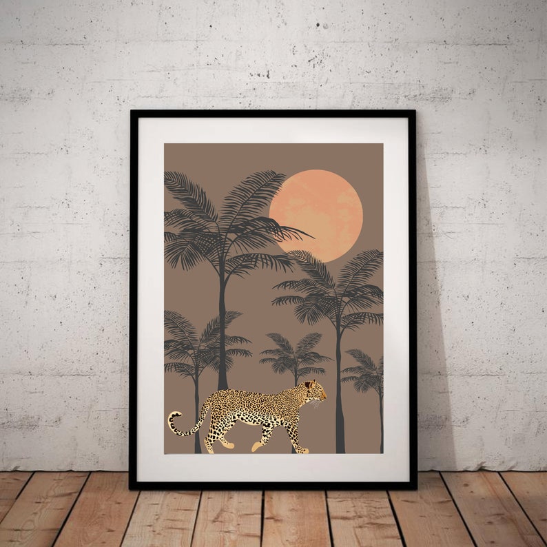 May include: A digital art print featuring a leopard walking through a palm tree forest with a large orange moon in the background. The print has a brown background and the leopard is gold and black.