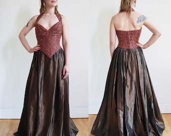 Vintage 1980’s | Small | Deadstock hand beaded silk halter top and taffeta skirt ensemble