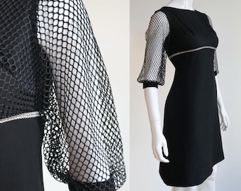 Vintage 1960’s | XS | Rayon cocktail dress with fishnet sleeves and diamanté decorated waist