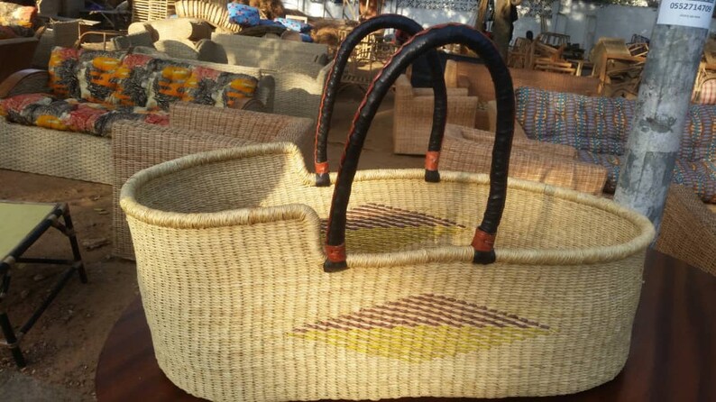 moses basket that attaches to bed