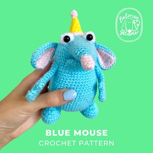 May include: A light blue crocheted mouse toy with large ears, a pink nose, and a yellow party hat. The mouse has black bead eyes and a round body. The text "Baloney Salami" is in the top right corner, and "BLUE MOUSE CROCHET PATTERN" is at the bottom.