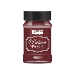 May include: A glass jar of red glitter paste with a black lid. The label reads "pentart Deluxe Paste".