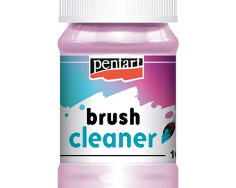 May include: A pink plastic bottle of Pentart brush cleaner with a white cap. The label features the brand name and the words "brush cleaner" in a bold, modern font. The background of the label has a splash of teal, blue, and purple.