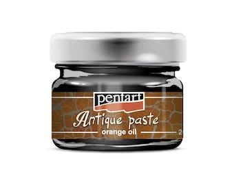 May include: A small glass jar of Pentart Antique Paste in orange oil. The jar has a silver lid and a label that says "Pentart Antique Paste orange oil".