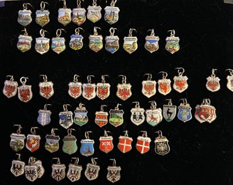 Vintage Austria Travel Shields and Hand Painted Charms in 800 835 silver 1940s to 1950s each Sold Separately New charms Jan 11, 2024