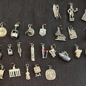 Vintage Germany Austria and Switzerland Charms in Sterling 800 835 silver 1950s to 1970s Each sold separately New Charms March 28, 2024