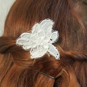 Ivory lace and bead pin