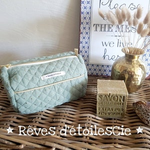 Toiletry bag quilted in double cotton with golden polka dots different colors.