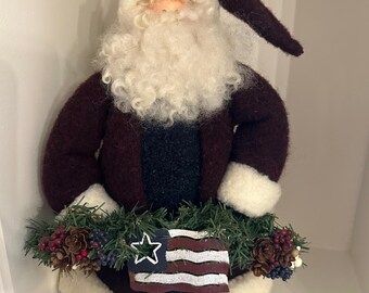 Papá Noel de estilo antiguo con guirnalda americana