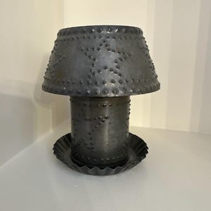 Punched tin candle lantern