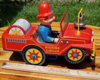 WORKING Antique BIGRING CIRCUS Tin Car With Bell and 360 Degree Steering. Epic Collectible Fun Tin Car.