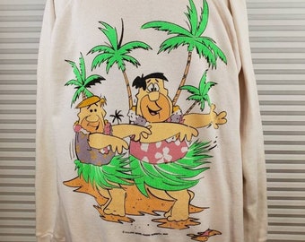 1985 Flintstones Luau Hula Dancing Sweatshirt. LARGE. Graphics on Front and Back. No Tag. Thin Fabric. Unaffecting Aesthetic Marking.