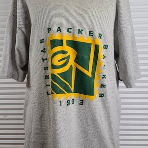 1993 Green Bay Packers &#39;First Packer Backer&#39; Striped Large T-shirt. Made in USA. Half Sleeve. A Few Slight Stains On Bottom and Collar.