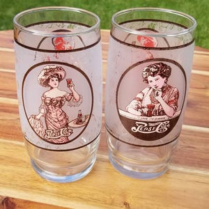 Gibson Girls 1970 Pepsi Cola Advertising Glasses. Excellent Condition. &#39;I Love It&#39;s Flavor.&#39; Re-live History And Sip From A Time Machine.