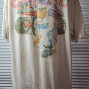 1993 Camel Motorsports Vintage Stained Single Stitch Monster Truck T-shirt. Silkworm tag. Made in USA.