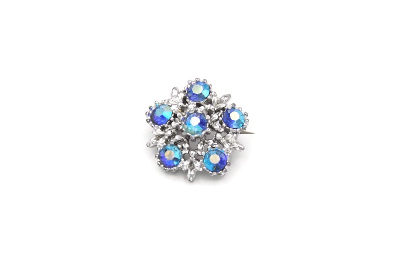 small blue brooch
