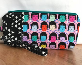 Small zipper pouch, cosmetic bag or travel bag made with Japanese design manga fabric and wrist strap