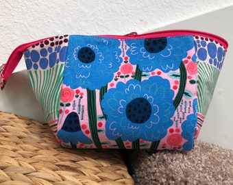 Zipper pouch, cosmetic bag, or travel bag handmade with whimsical floral designer fabric