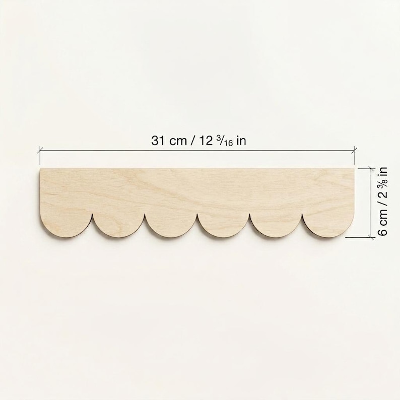 May include: A wooden shelf with a scalloped edge, measuring 12 3/16 inches long and 2 3/8 inches wide. The shelf is made of light-colored wood and has a simple, decorative design. The dimensions are also provided in centimeters.