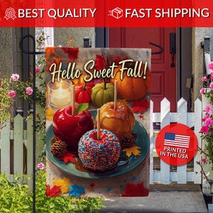May include: A decorative garden flag featuring three candy apples on a plate, one red, one caramel, and one covered in colorful sprinkles, with pumpkins and a candle in the background. The text Hello Sweet Fall is printed in a script font.