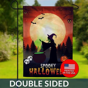 May include: Double-sided Halloween garden flag featuring a witch stirring a cauldron under a full moon. The flag has a spooky design with bats, pumpkins, and the words "Spooky Halloween". Printed in the USA.