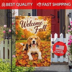May include: A rectangular garden flag featuring a beagle lying on a bed of fallen autumn leaves. The text "Welcome Fall" is printed in brown script above the dog. The background shows a forest with orange and yellow trees under a bright sky.