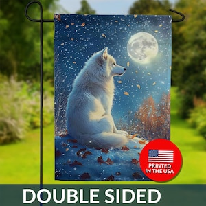May include: Double-sided garden flag featuring a white wolf under a full moon in a starry night scene. The flag has a red circle with the text "PRINTED IN THE USA" and the American flag. The bottom of the flag reads "DOUBLE SIDED".