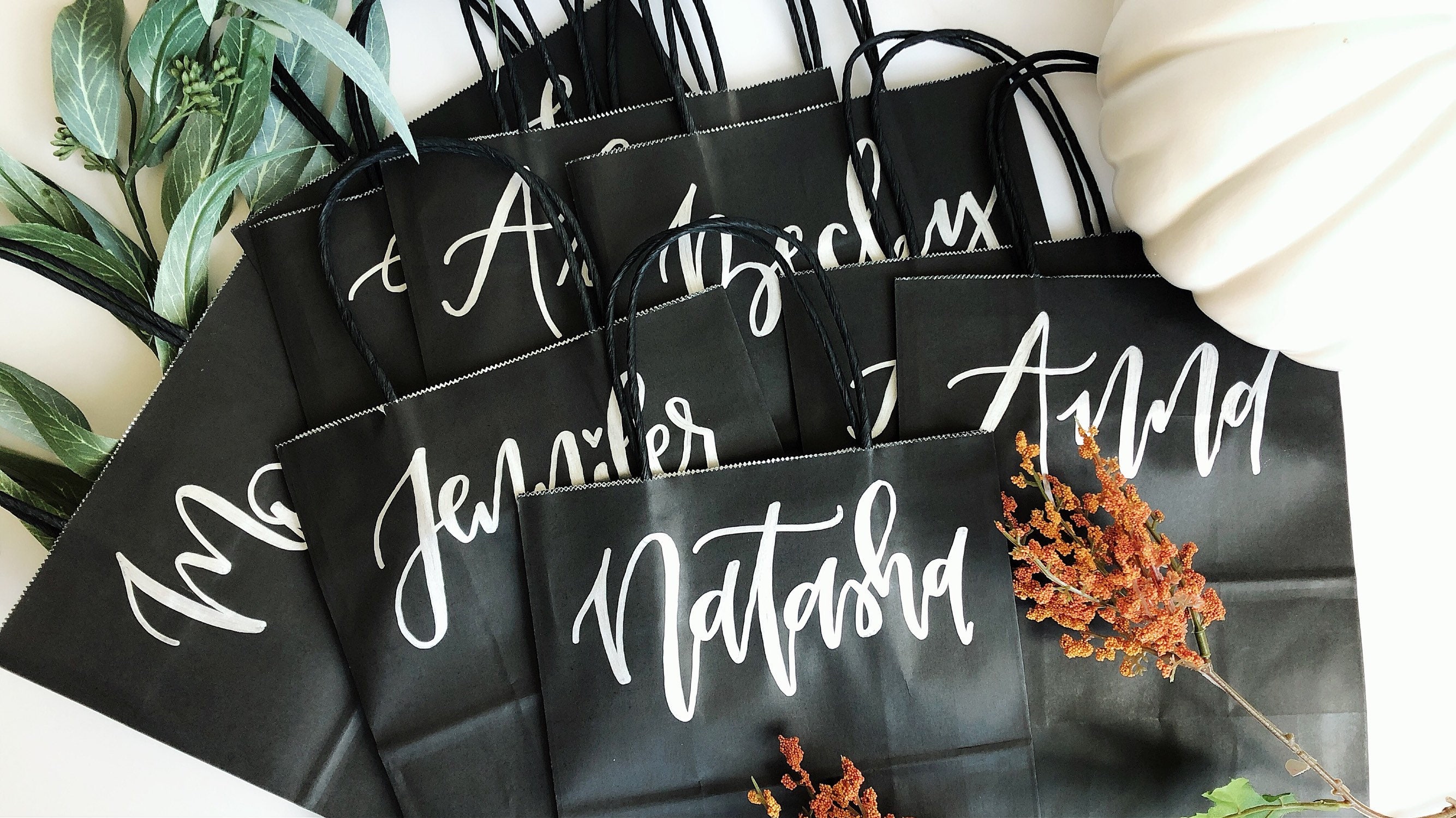 Don't blend in with the crowd when gifting your favorite people this year! Opt for customized gift bags for any person and for any occasion! These bags add a touch of flair and a sprinkle of a personal touch to anyone who receives them! | www.littlefoxlettering.com