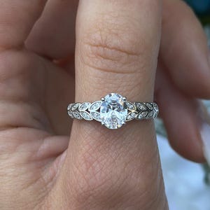 Halo Oval 1.21 Carat Diamond CZ Wedding Engagement Art Deco Bridal Promise Ring Round Diamond CZ 925 Sterling Silver Flower Shank