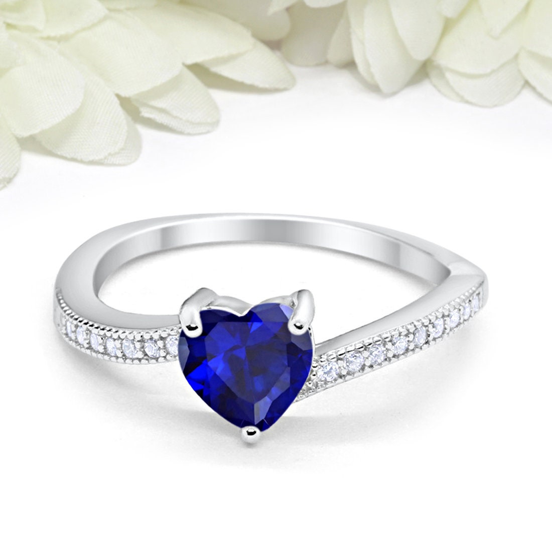 0.6ct Heart-cut Simulated Blue Sapphire Crossover Promise Ring Silver -  Trustmark Jewelers