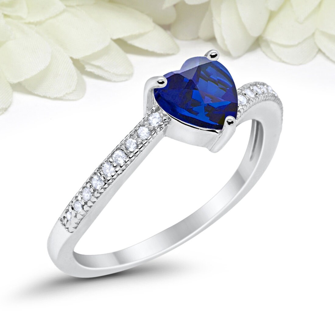 Anillo corazon azul sale