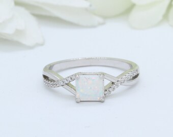 Princess Kylie Blue Synthetic Opal V Shape Band Ring Sterling Silver Princess Kylie Blue Synthetic Opal V Shape Band Ring Sterling Silver
