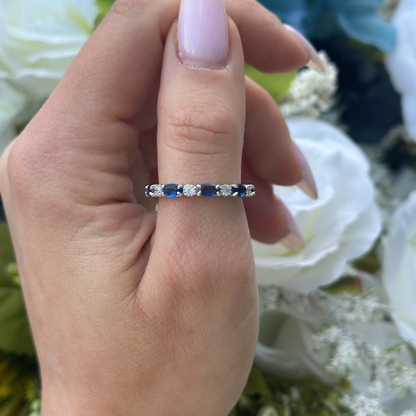 Sterling Silver Eternity Band Ring: Simulated Diamond & Blue Sapphire CZ