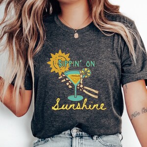 Funny Sippin on Sunshine Skeleton Summer Womens T-shirt, Cute Skeleton Cocktail Tshirt, Graphic Summer Cocktail Shirt for Her, Fun Beach Tee