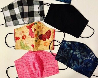 Two layer reversible 100% cotton face mask.