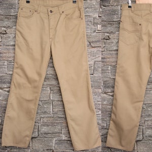 ヴィンテージ LEVI'S For Men ポリエステル パンツ、34 ウエスト、サンドブラウン メンズ ジーンズ、ストレートレッグ ジーンズ、タロン 42 ジップ、W34 L31