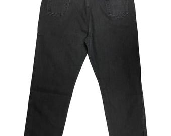 Jean Rustler noir vintage, taille haute, denim américain années 90, coupe droite, taille homme W50 L30, excellent état.
