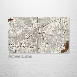 May include: A wood-mounted map of Fort Worth, Texas, with a cream background and black lines. The city name is written in brown cursive script with the state name below it. The text "Papier Blanc" is written in black below the map.